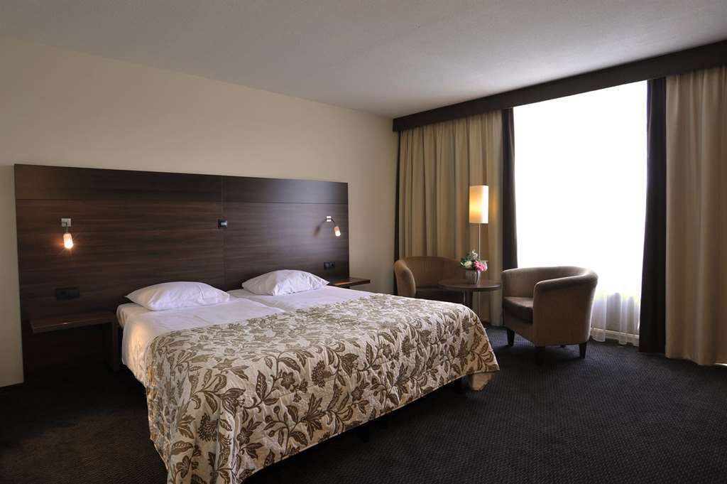 Fletcher Hotel-Restaurant De Reiskoffer Bosschenhoofd Номер фото