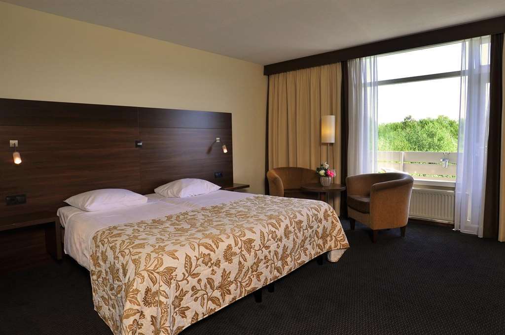 Fletcher Hotel-Restaurant De Reiskoffer Bosschenhoofd Номер фото